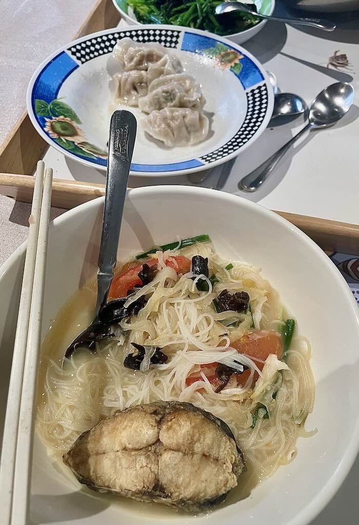Fish head noodles in milky broth