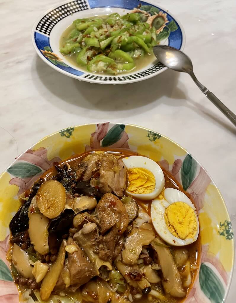Spicy Mala noodles soup with chicken,egg,vegetables