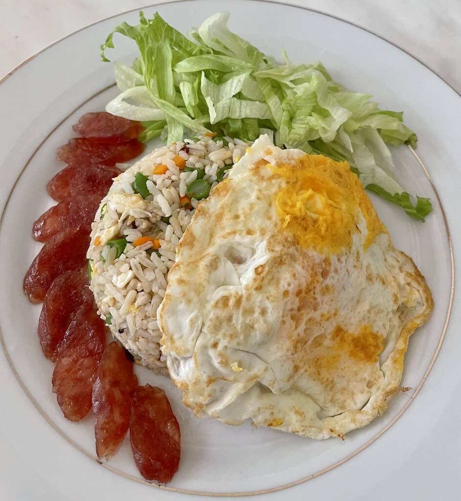 Nasi goreng with chinese sausage and fried egg