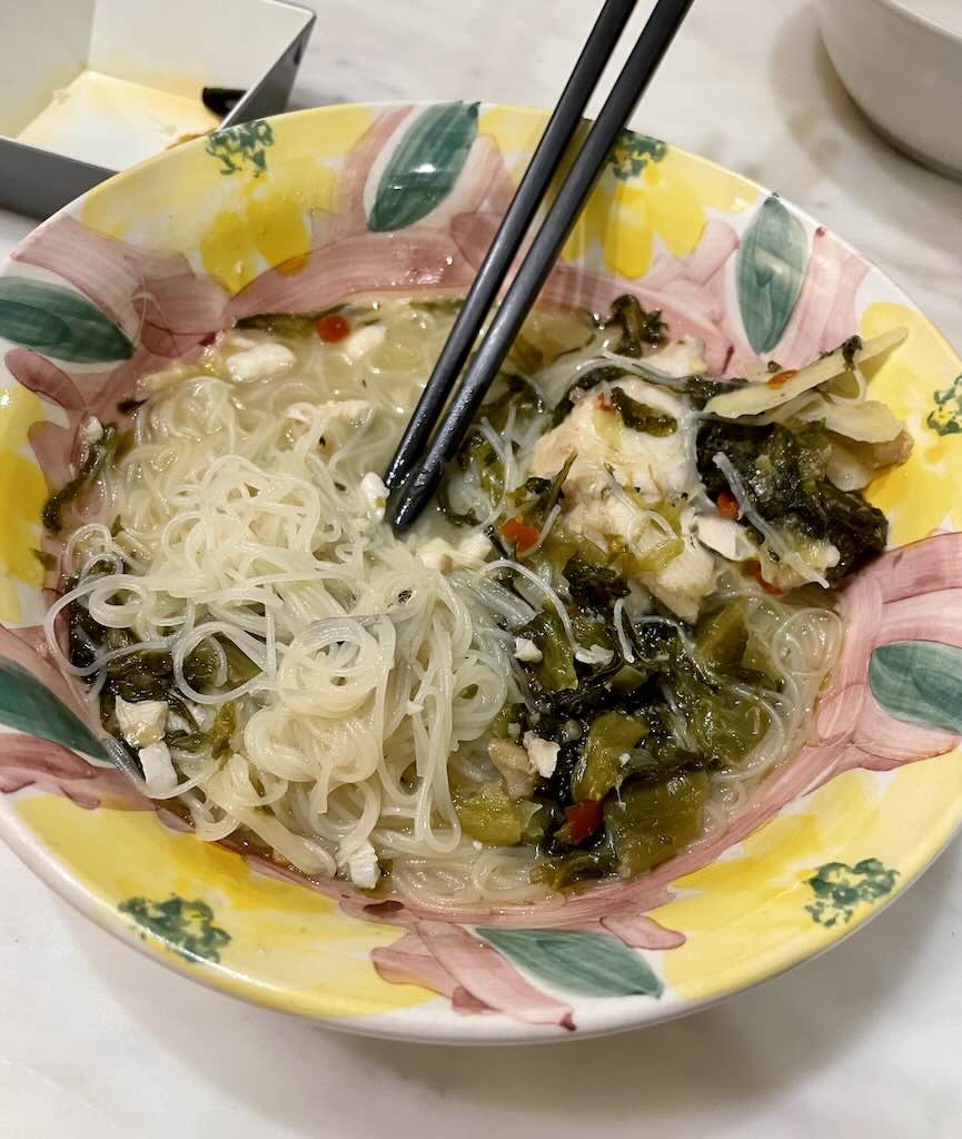 Pickled noodles soup served with fish