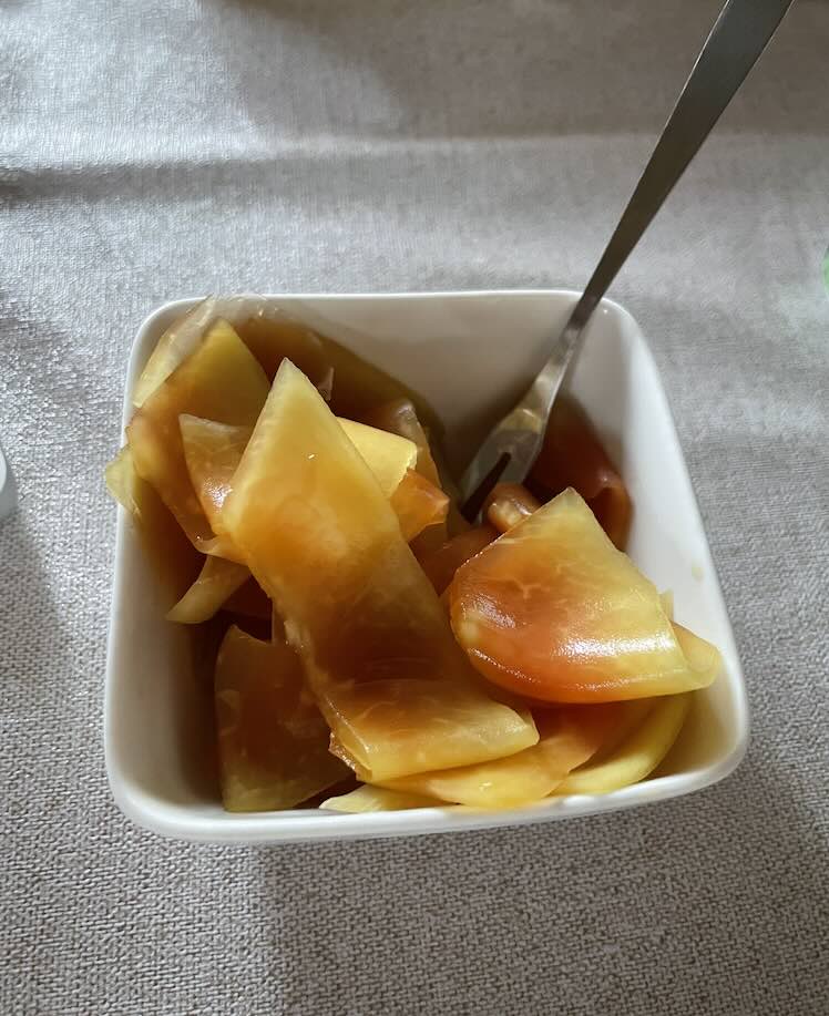 Pickled papaya in a cup