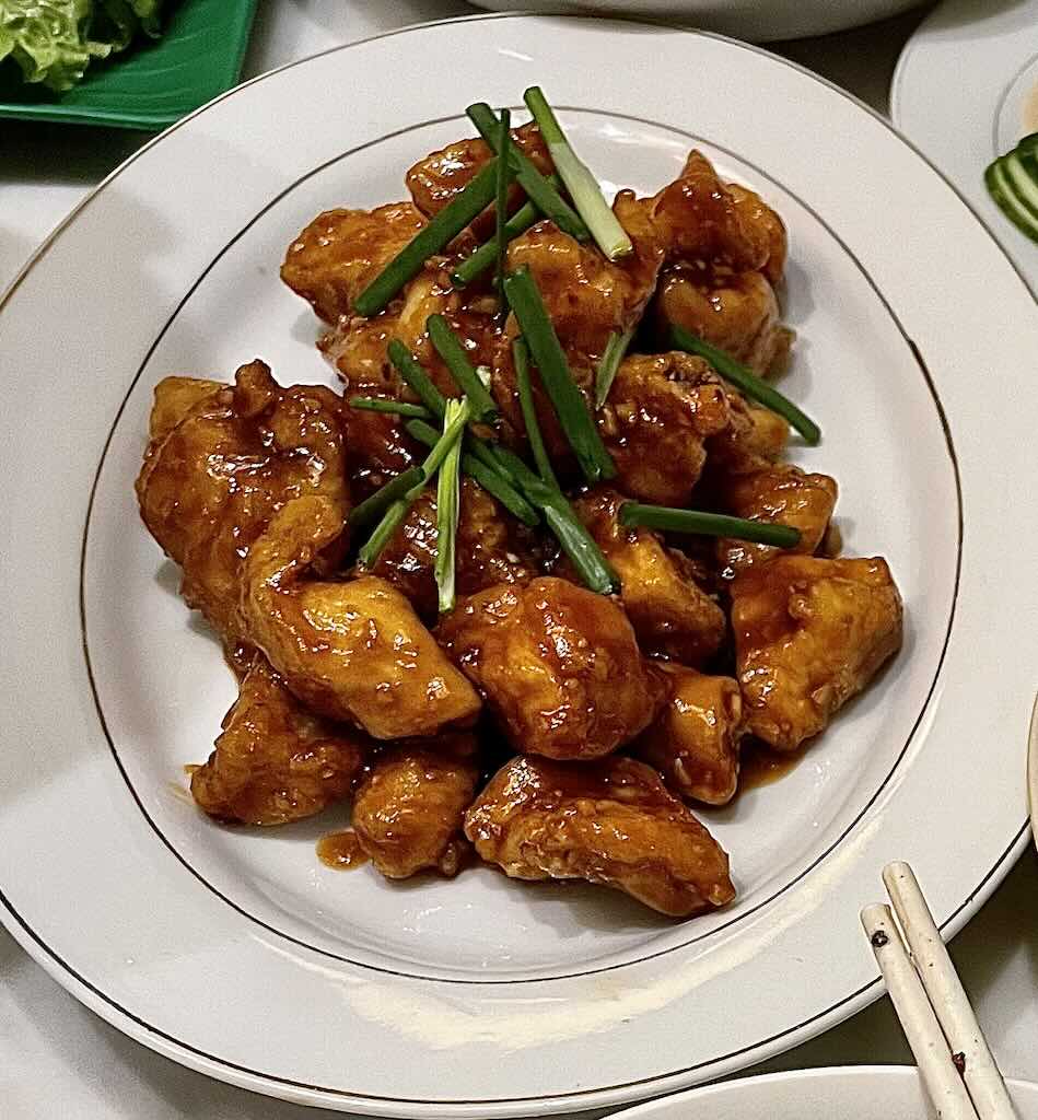 Sweet and sour chicken coated in sauce